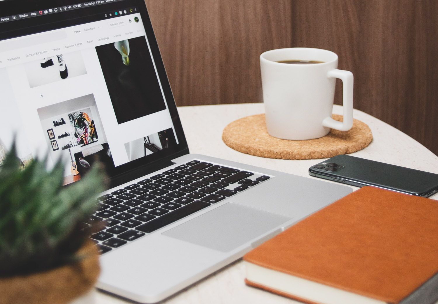 desk with laptop and coffee